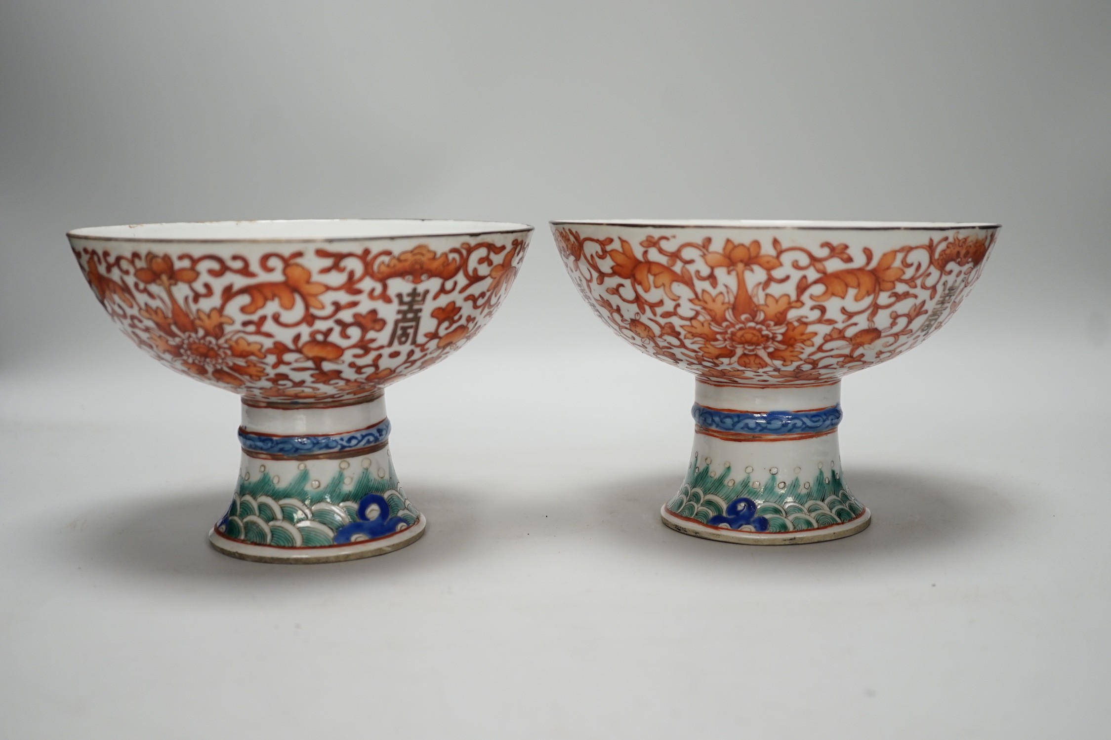A large pair of 19th century Chinese stem bowls, painted with bats, Shou and lotus flowers, 12cm tall